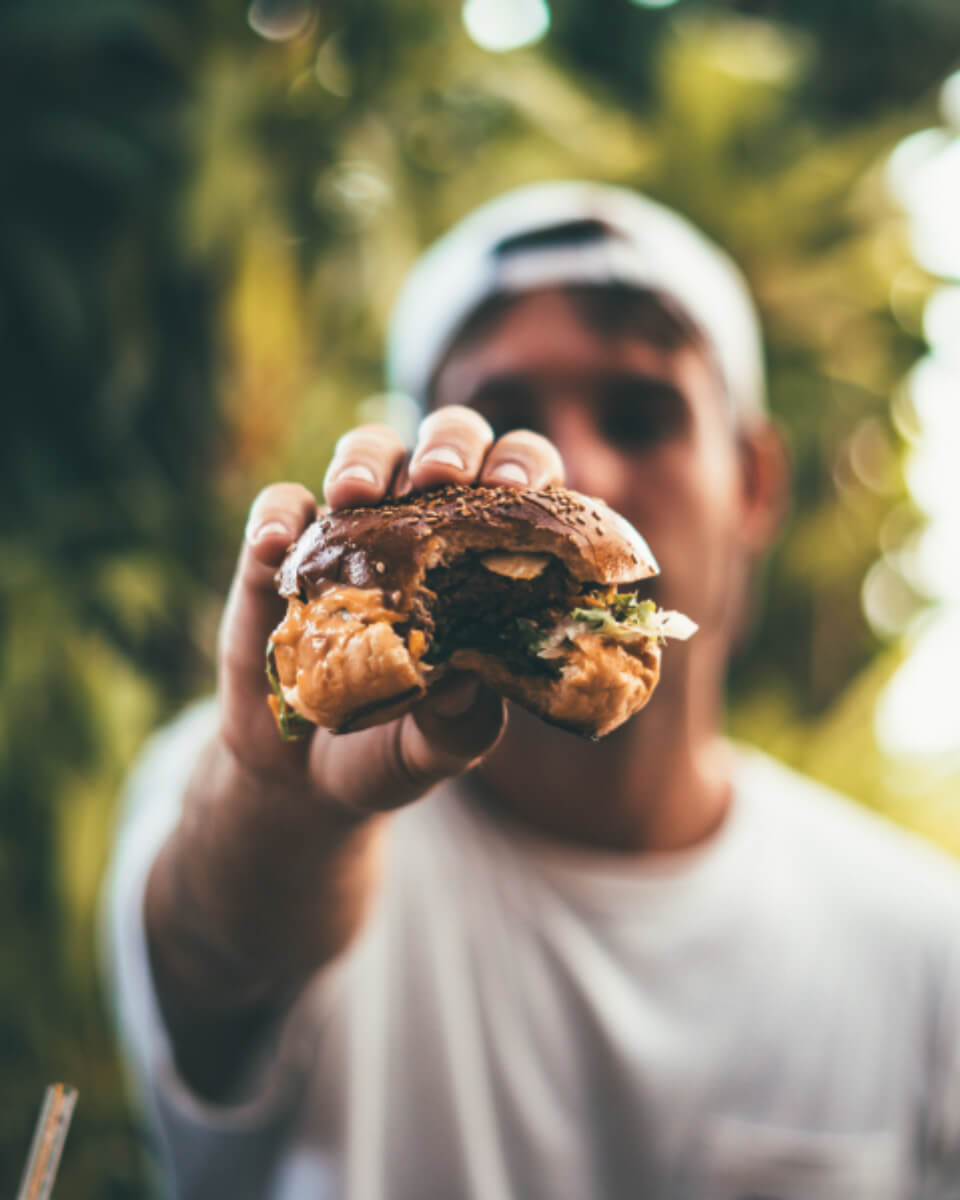 Man Eating PTPFNIQGTQ